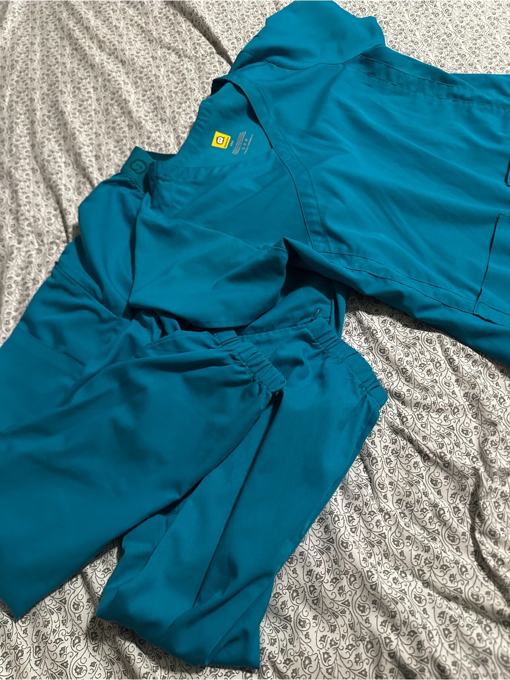 Wink Teal Women's scrub set.